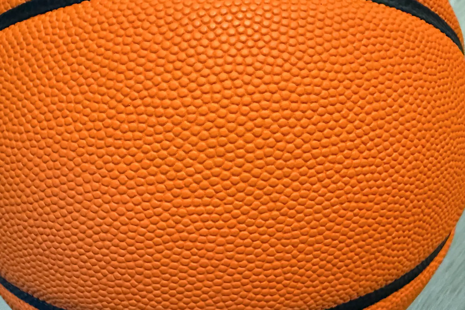 A close-up of the texture on the Wilson NCAA Evo NXT Game Basketball