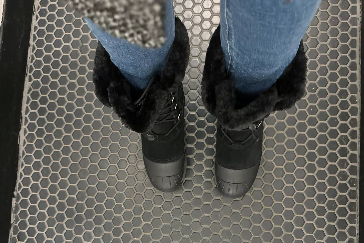 A person wears a pair of Baffin Chloe Womenâs Boots outside