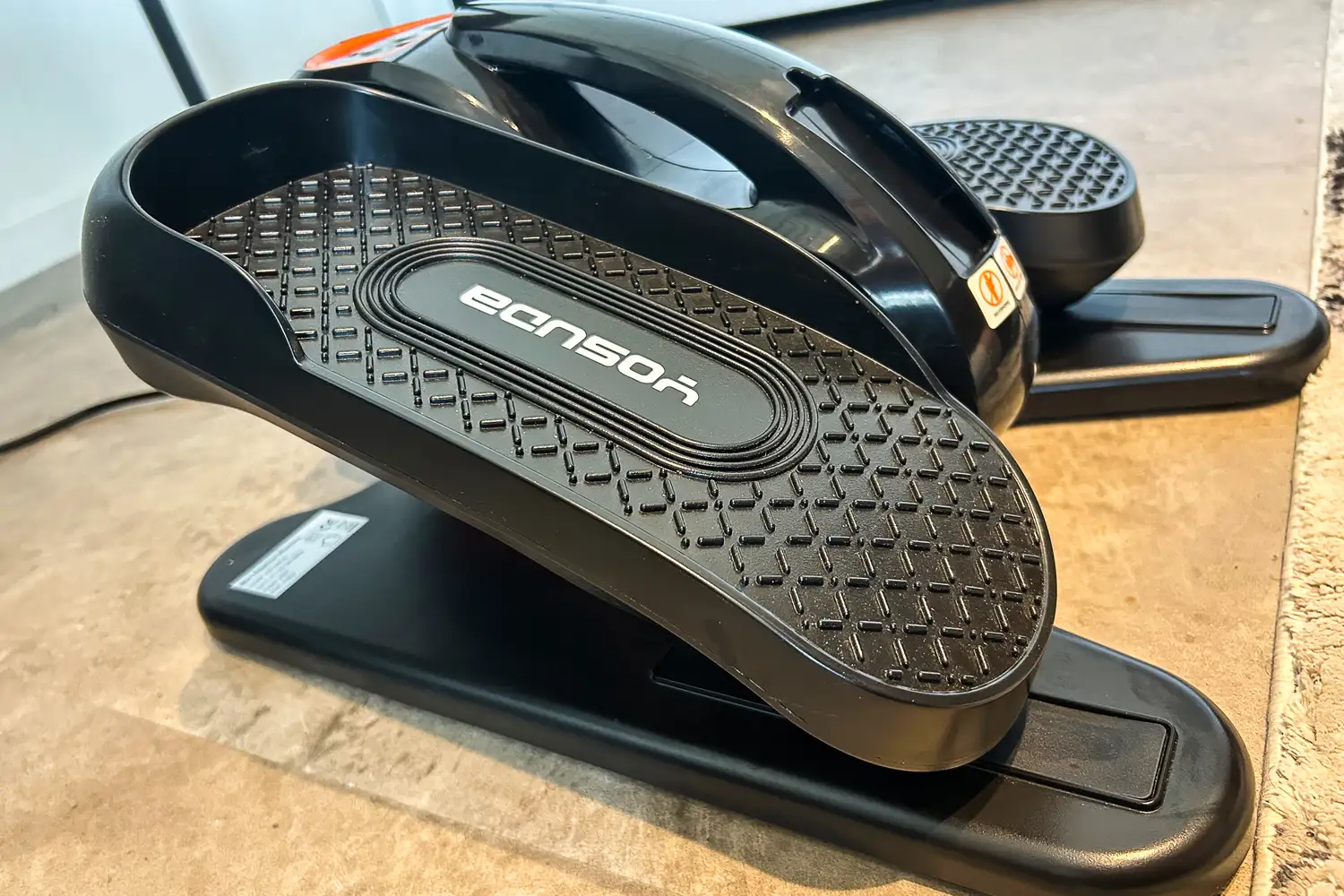 The brand name on the pedal of the YOSUDA E5 Under Desk Elliptical Machine