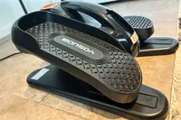 The brand name on the pedal of the YOSUDA E5 Under Desk Elliptical Machine