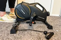 A side view of the YOSUDA YBM-2 Under Desk Bike Pedal Exerciser