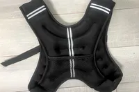 The mesh pocket on the back of the Zelus Weighted Vest