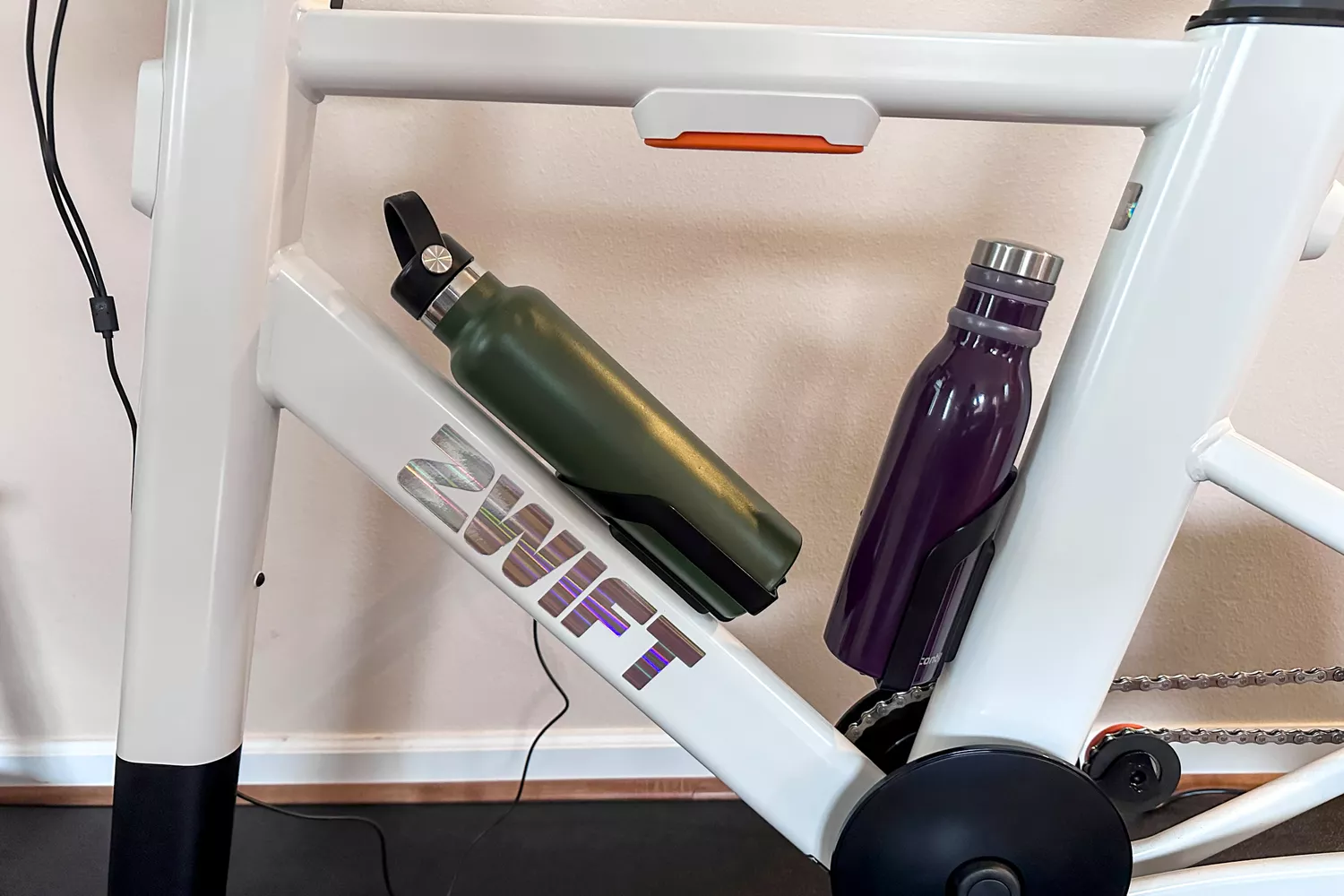 The water bottles secured on the Zwift Ride with KICKR CORE