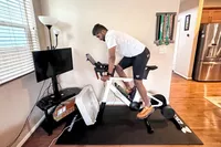 A person rides on the Zwift Ride with KICKR CORE