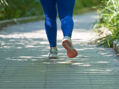 woman running showing only backs of legs and feet