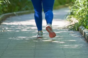 woman running showing only backs of legs and feet