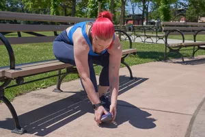 Woman massaging her foot