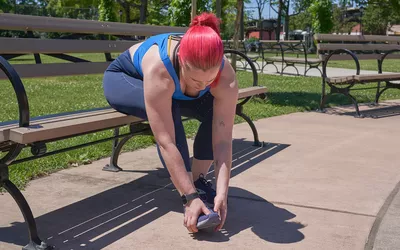 Woman massaging her foot